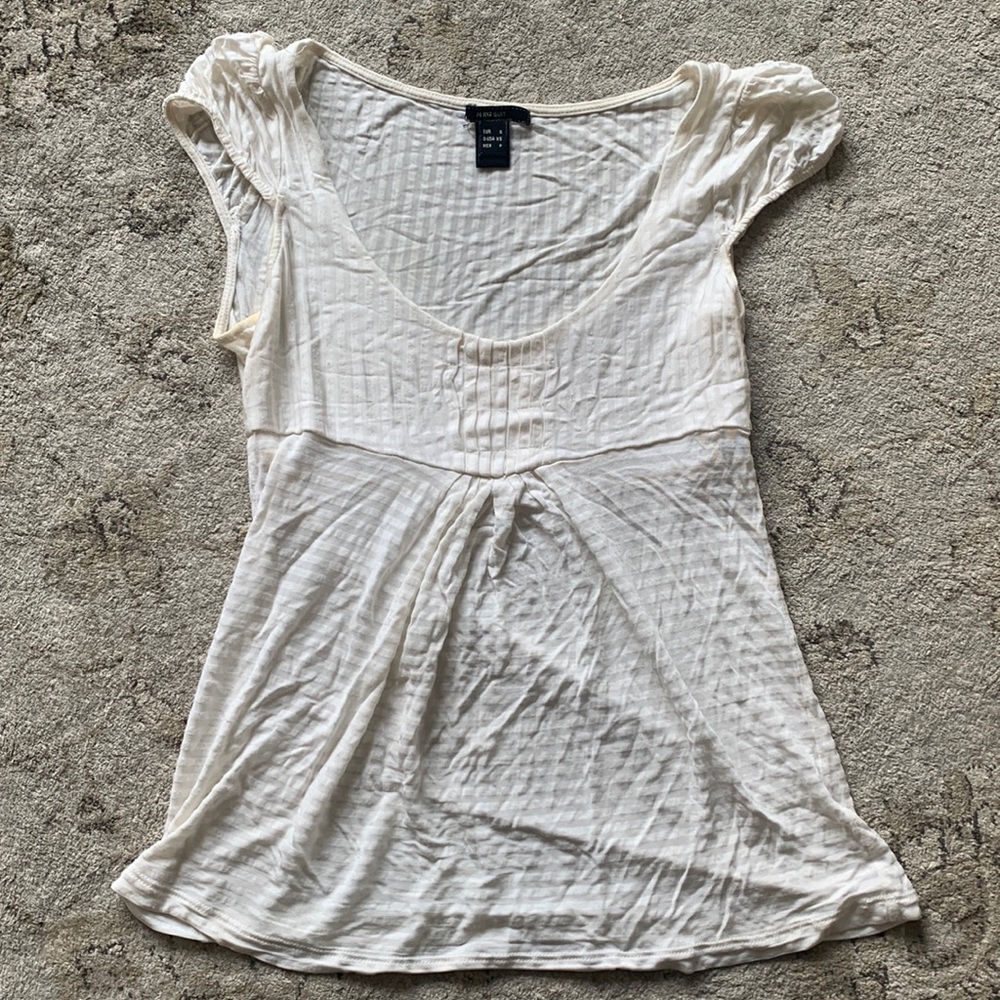 A very cute white top, perfect for summer weather!